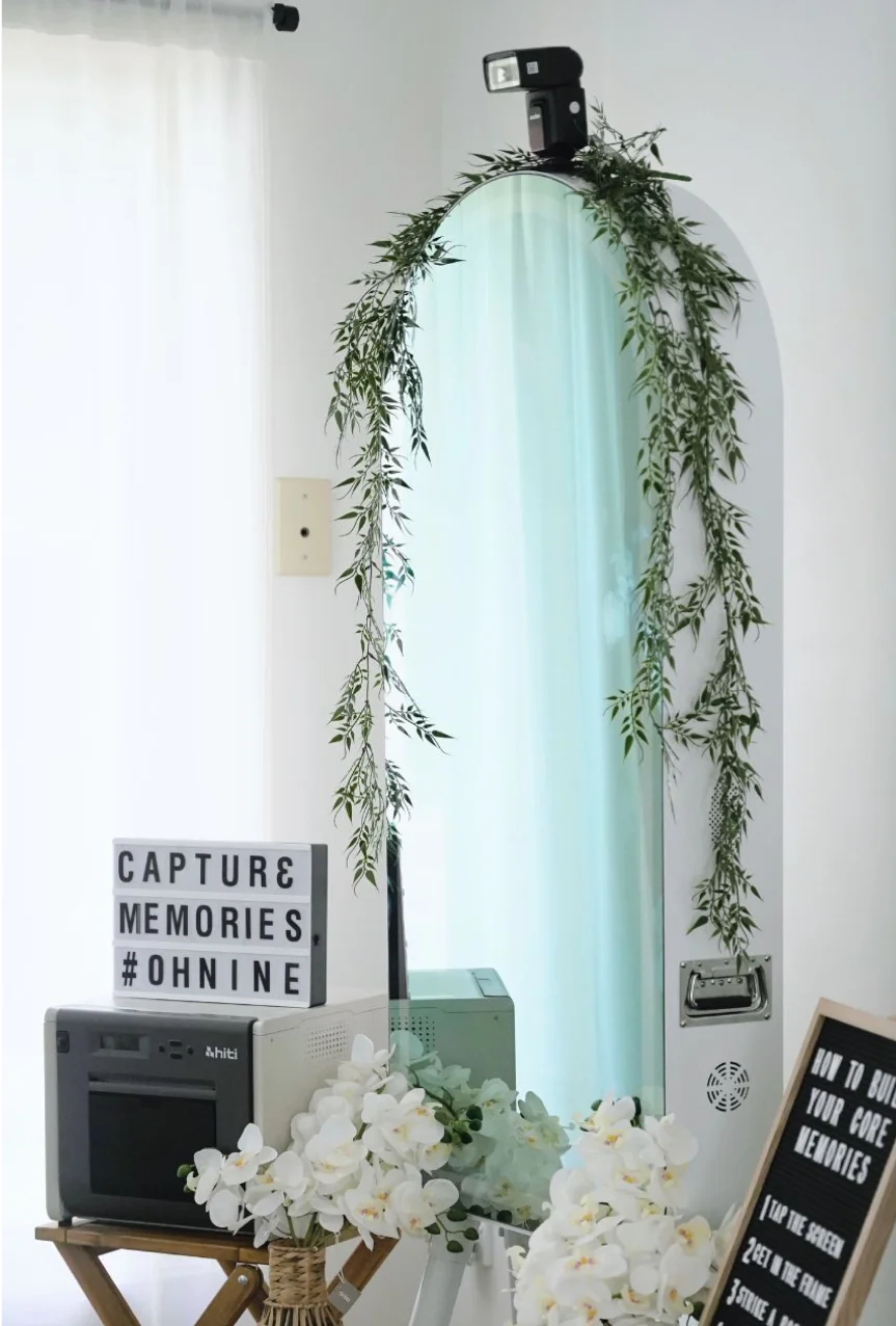 Oh Nine mirror photobooth with foliage